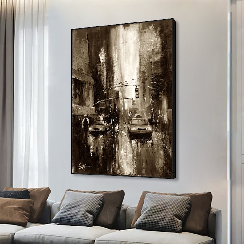 May include: A sepia-toned abstract painting of a city street scene with two cars and pedestrians. The painting has a textured, brushstroke effect and a light background.