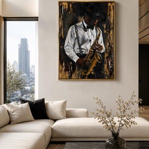 May include: A framed wall art piece depicting a musician wearing a hat, white shirt, and suspenders while playing a gold saxophone. The painting features a dark, textured background with gold accents, presented in a thin gold frame on a wall.