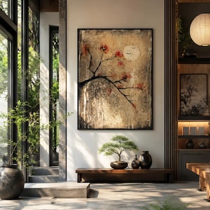 May include: A rectangular wall art piece featuring a textured, neutral-toned background with a dark, sprawling branch adorned with small red blossoms and a pale circular moon shape, all enclosed within a thin, dark, minimalist frame.