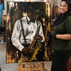 May include: A large rectangular oil painting on canvas depicting a musician wearing a fedora, white shirt, and suspenders while playing a gold saxophone. The artwork features a high-contrast color palette of deep black, white, and metallic gold accents.