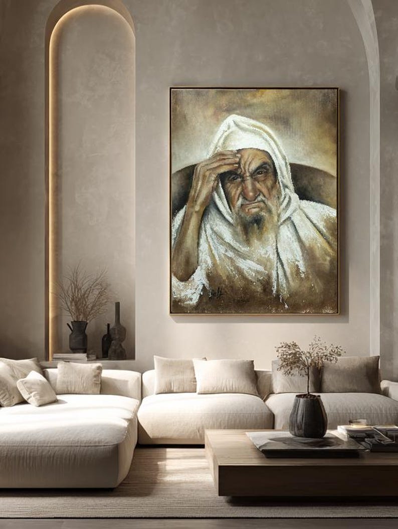 May include: An oil painting on canvas depicting an elderly person with a long beard wearing a white hooded garment. The figure has a hand resting on their forehead with a serious expression. The artwork features earthy brown and white tones.