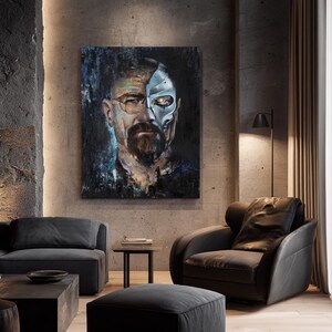 May include: A rectangular wall art piece featuring a portrait of a man with a beard and glasses on the left side, transitioning into a metallic, robotic skull structure on the right side, rendered in dark blue, black, and silver tones.