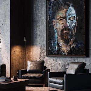 May include: A rectangular framed wall art piece featuring a portrait of a man with a beard and glasses. The left side of the face is realistic, while the right side is depicted as a metallic, robotic cyborg structure with a glowing yellow eye.