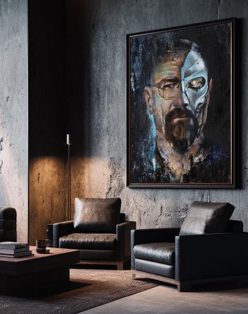 May include: A rectangular framed wall art piece featuring a portrait of a man with a beard and glasses. The left side of the face is realistic, while the right side is depicted as a metallic, robotic cyborg structure with a glowing yellow eye.