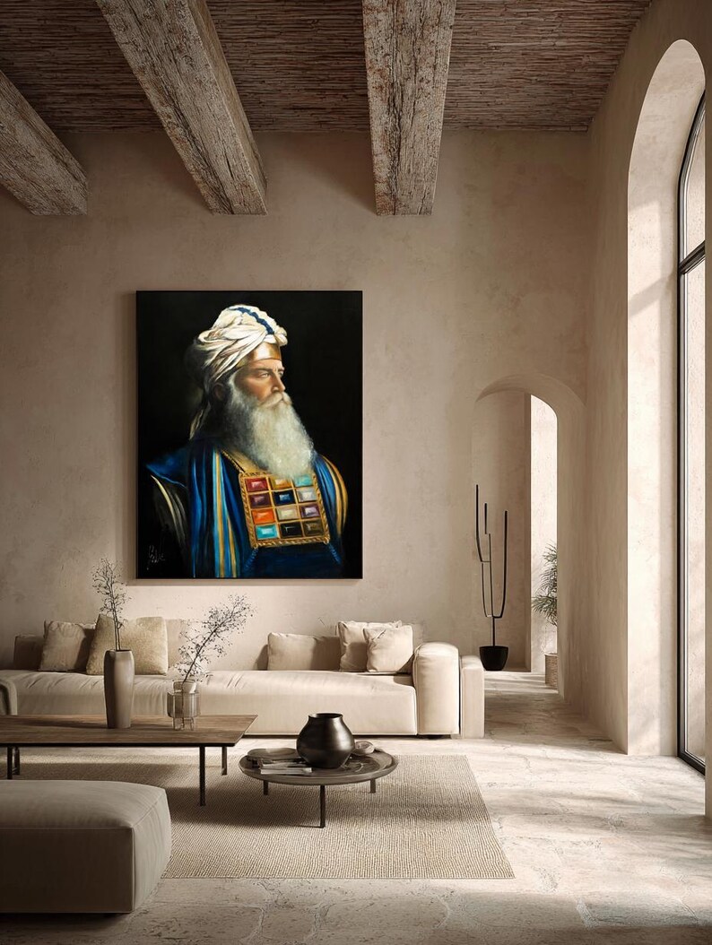 May include: A square wall art print featuring a portrait of a bearded individual wearing a white turban with blue accents and a blue garment adorned with a large rectangular chest piece containing a grid of colourful, square-shaped gemstones.