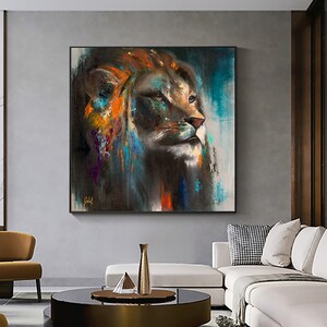 May include: A square wall art piece featuring an expressive oil painting of a lion's head in profile. The artwork utilizes a dark color palette with vibrant streaks of orange, blue, and purple paint, showcasing a textured, abstract style.