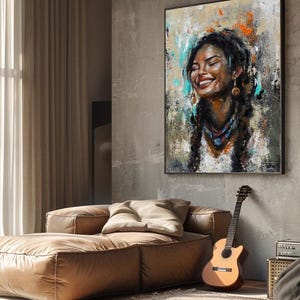 May include: A rectangular wall art piece featuring an expressive oil painting of a smiling person with braided hair. The artwork uses a textured palette of white, black, brown, orange, and teal tones, framed in a thin black border on a wall.