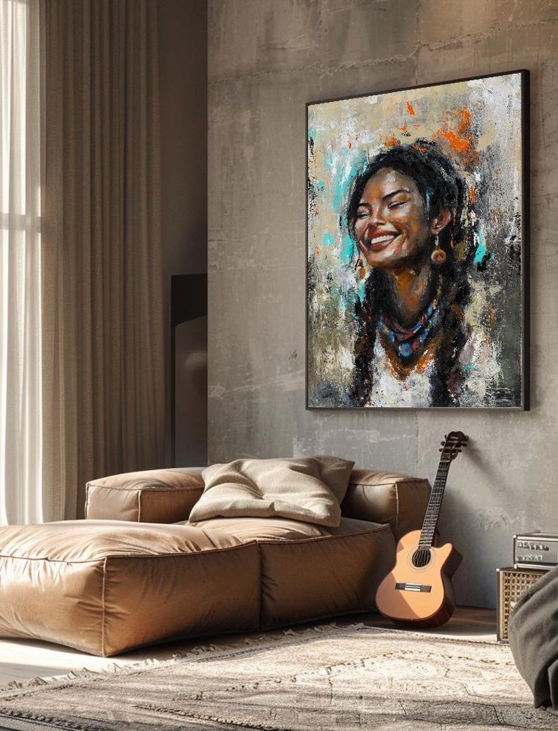 May include: A rectangular wall art piece featuring an expressive oil painting of a smiling person with braided hair. The artwork uses a textured palette of white, black, brown, orange, and teal tones, framed in a thin black border on a wall.
