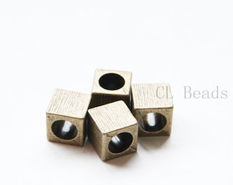 8838Y-E-124B 30pcs Antique Brass Tone Base Metal Spacers-Round 11x8mm