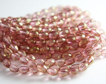 10 Pieces Czech Fire Polish Oval Melon Cut -Pink Luster 7x5mm (10800-106-M-90)