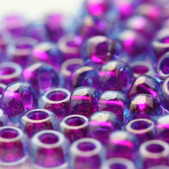 6-352, Miyuki 20g Fuchsia Lined Aqua Luster 6-352, Miyuki 20g Fuchsia Lined Aqua Luster