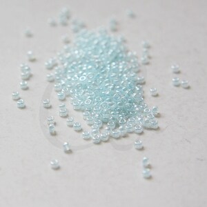 10 Gramm Japanische Miyuki 11/0 Rocailles - Light Crystal Aqua - 2mm (11M3-110522-M-652)