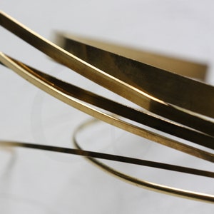 thumbnail image 2 of One Meter (3.28ft) Half-Hard Brass Wrapping Wire – Flat, 18 Or 20 Gauge For Jewelry Making 2 of 2