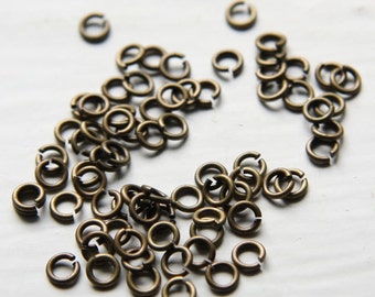 100 Pieces Antique Brass Plated Brass Base Opened Jump Rings-4mm (21 Gauge) (327C-I-14B)