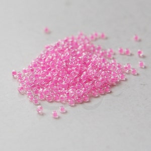 10 Gramm Japanische Miyuki 11/0 Rocailles - C/L Pink Luminous Neon Color - 2mm (11M4-114299-M-645)