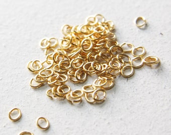 100 Pieces Matte Gold Plated Brass Base Oval Jump Rings-5x4mm (21 Gauge) (319C-I-5F)