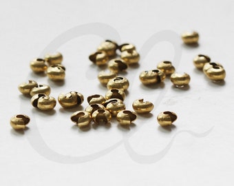 2 TAPPI OTTONATI LUCIDI TONDO ZAMA