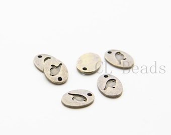 30 sztuk zawieszek z metalu bazowego w kolorze antycznego mosiądzu - Ptak 7 x 9 mm (26518Y-T-209)