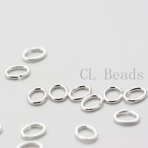 20 Pieces OPENED Sterling Silver Oval Jump Rings - 5x4mm (21 Gauge)