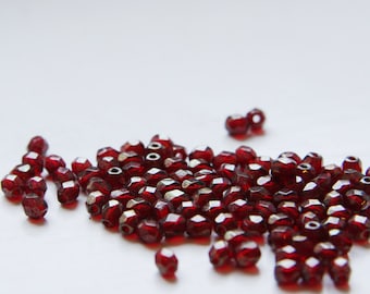 50 Pieces Czech Fire Polish Glass Faceted Round-Transparent Garnet Luster 4mm (CZ4A-4794-M-50)