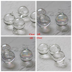 水入りガラスチャーム 2 個 - 25 x 18 mm (G149)