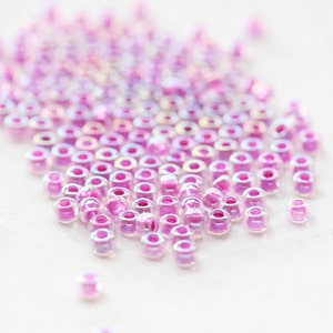 10 Gramm Japanische Miyuki 11/0 Rocailles - Magenta AB lined-Dyed - 2mm (11M2-110264-M-631)