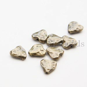 10 Pieces Zinc Based Based Alloy Spacer Textured Heart 10.5x10mm 26528Y Antique Brass