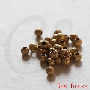 100 piezas Raw Brass Stardust Round Spacer Abalorios - 3x2.6mm (3614C-V-190)