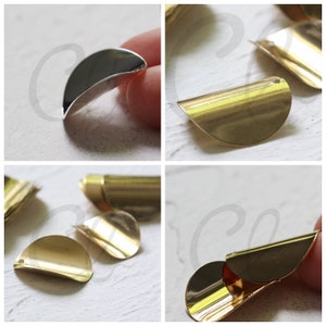 May include: A set of gold-colored metal half-circle shapes with a hole in the center. The shapes are arranged in a variety of positions, showing the different ways they can be used.