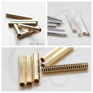 May include: Close-up shots of raw brass and silver-colored hexagonal tube beads. The beads have a textured, ridged surface and are shown in various arrangements. The words "Raw Brass" are printed on the image.