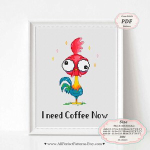 May include: Cross stitch pattern PDF featuring a cartoon rooster with big eyes and the text "I need Coffee Now". The pattern is 94 stitches wide by 113 stitches high and uses 15 colors.