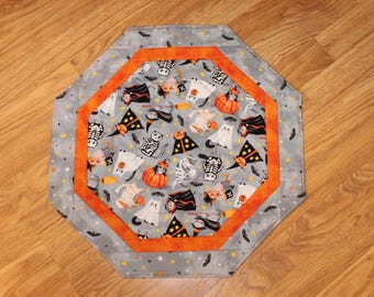 Get in the Halloween Spirit with this Festive Octagon Table Runner featuring Ghosts and Goblins