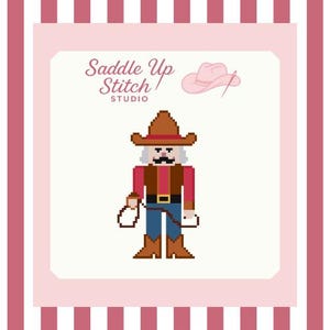 May include: A pixelated illustration of a cowboy nutcracker wearing a brown hat, red shirt, and blue jeans. The image includes the text "Saddle Up Stitch Studio" and a pink cowboy hat with a needle and thread.
