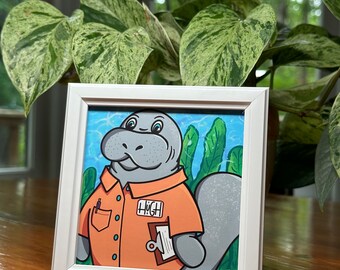 Hugh Manatee Framed Art Print