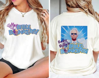 May include: White t-shirt with a blue and purple graphic that says "Baby Billy's Bible Bonkers!" and features a cartoon image of a man with white hair and a beard.