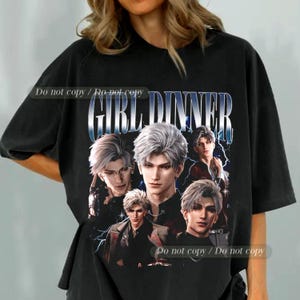 May include: Black t-shirt featuring a graphic of anime-style characters with silver hair and the text "GIRL DINNER" in a stylized font. The design includes lightning bolt accents and the phrase "Do not copy / Do not copy".