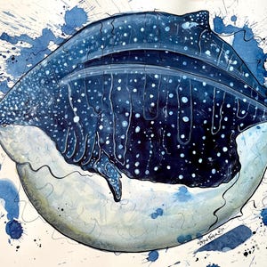 May include: A watercolor painting of a whale shark with a dark blue body covered in white spots, positioned above a large, pale circular shape. The artwork features blue paint splatters and ink outlines against a white background.