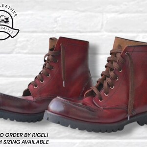 May include: A pair of deep red leather lace-up boots with brown laces and thick black lug soles. The boots feature a rounded toe design and a high-top silhouette. A logo in the top left corner reads RIGELI LEATHER HAND CRAFTED.