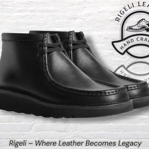 May include: Black leather ankle boots with a rounded toe and a thick sole. The boots have a lace-up closure and are labeled "Rigeli Leather, Hand Crafted". The text "Where Leather Becomes Legacy" is at the bottom.