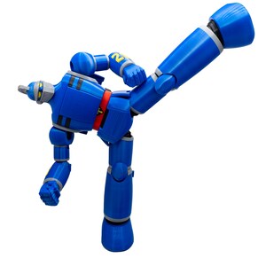 May include: A blue robot action figure with articulated joints, striking a dynamic pose. The figure has a red belt, gray accents, and the number "2" on its shoulder. The robot is set against a plain white background.