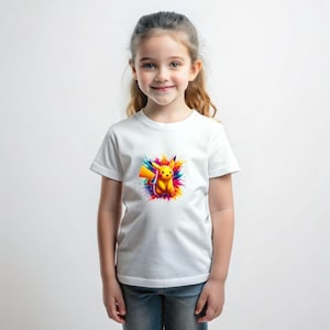 May include: A white t-shirt with a colorful graphic of Pikachu, a popular cartoon character, surrounded by colorful paint splatters.
