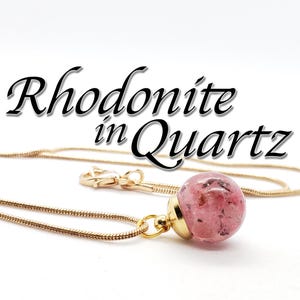 Rhodonite in Quartz Crystal Orb Necklace