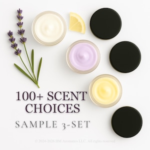 May include: Three small round jars containing white, light purple, and yellow creams, accompanied by three black lids, a sprig of lavender, and a lemon slice. The text reads 100+ SCENT CHOICES SAMPLE 3-SET, with a copyright notice at the bottom.