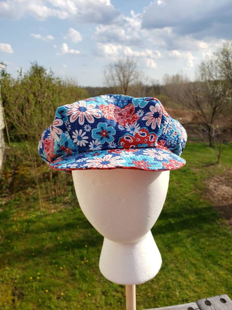 Tutti Frutti reversible Newsboy Cap with red white and blue flowers