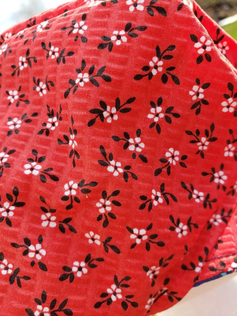 Tutti Frutti reversible Newsboy Cap with red white and blue flowers