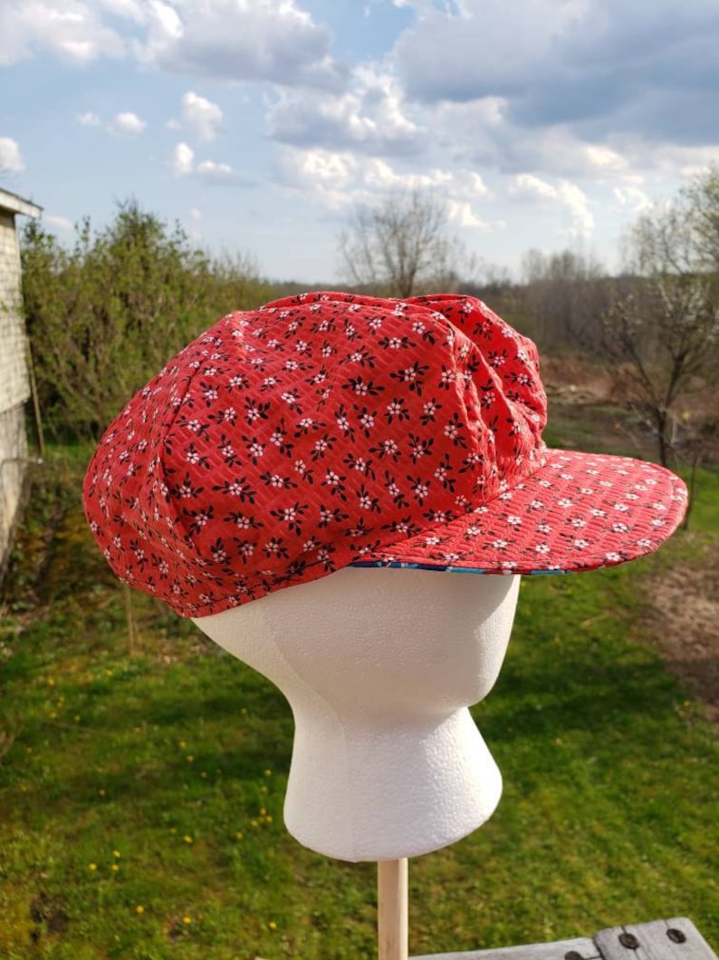 Tutti Frutti reversible Newsboy Cap with red white and blue flowers
