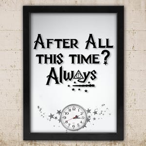 May include: Black framed print with the text "After All This Time? Always" in a stylized font. The print includes a wand, stars, and a clock. The background is white.
