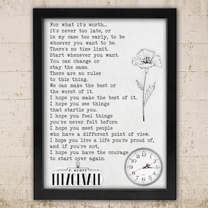 May include: Black framed print with a white background featuring a quote by F. Scott Fitzgerald. The quote is accompanied by a floral illustration and a clock. The text includes phrases like "For what it's worth..." and "Start whenever you want."
