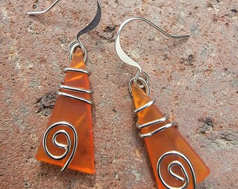 Wire wrapped tumbled glass earrings-orange glass