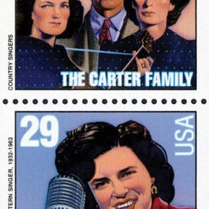 May include: A strip of four 29p postage stamps showcasing country music icons. Hank Williams with a guitar, The Carter Family, Patsy Cline with a microphone, and Bob Wills with a violin. Each stamp includes "USA" and the artist's name.
